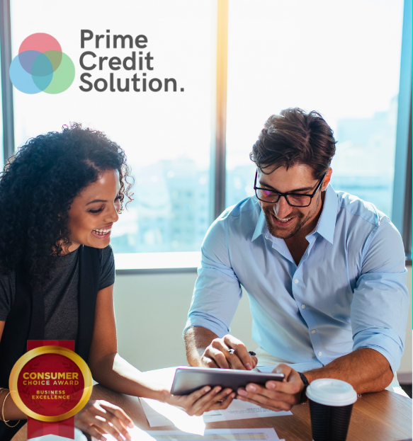 Professional financial advisors at Prime Credit Solution helping a client explore debt relief and financial wellness options in a bright office setting.
